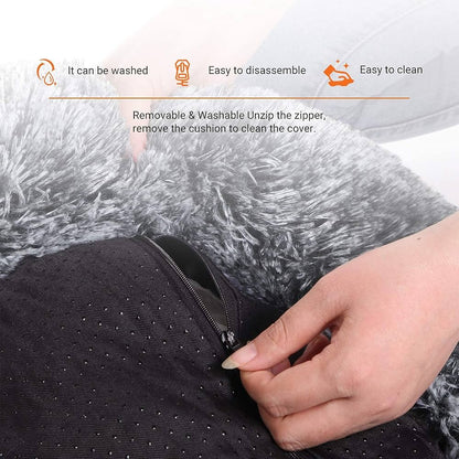 Hands unzipping the zip on the underside of the bed to remove the inner cushion and wash the cover