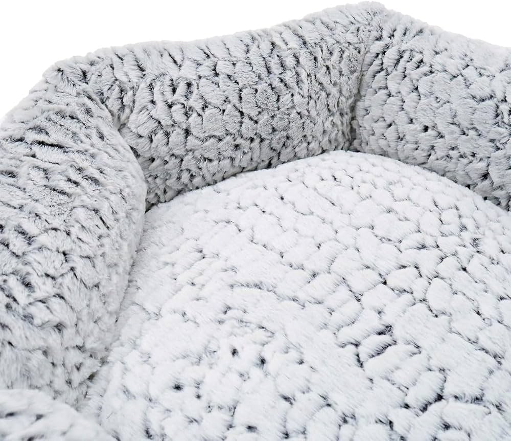 Close up of the silver grey faux fur texture on the bolster and cushion of the Rosewood plush bed