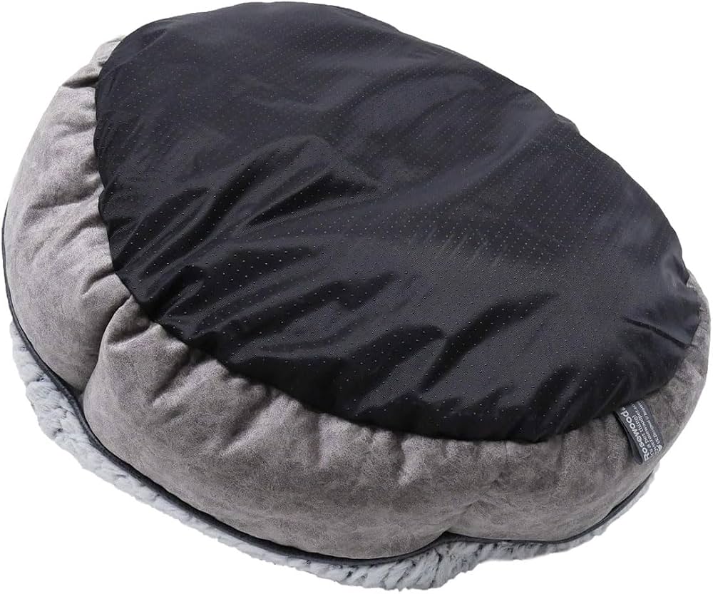Underside of the Rosewood plush bed showing the black non-slip dotted base and the Rosewood label